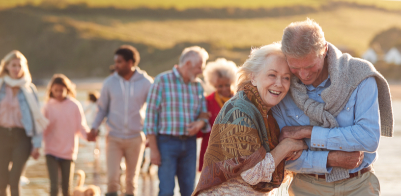 Retired couples and a family outside