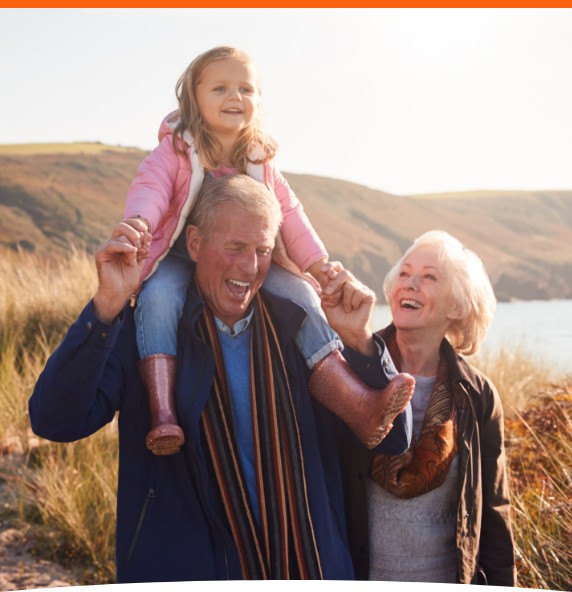 Retired couple and granddaughter